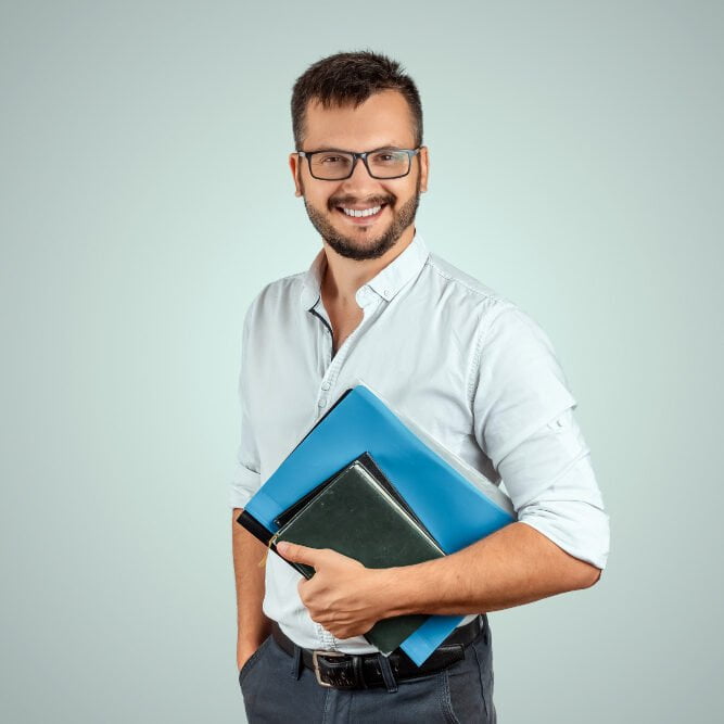 portrait-young-male-teacher-light-background